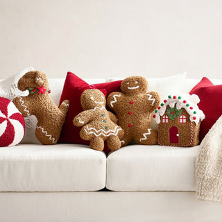 Comodo cuscino Gingerbread House con caramelle gommose pom-pom a forma di bastoncino di zucchero e accenti natalizi